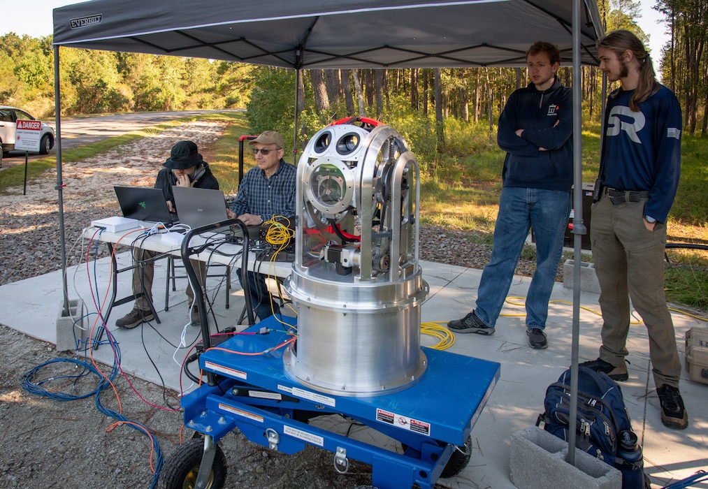 Testing free-space optical communication with laser technology at NIWC Atlantic.
