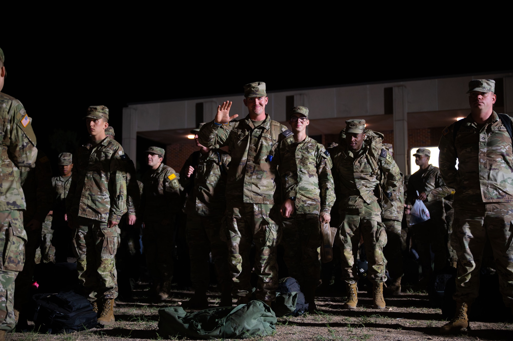 U.S Army soldiers, attached to the 344th Military Battalion, prepare for final accountability at the Base Theater, Goodfellow Air Force Base, Texas, Dec. 19, 2025. These soldiers eagerly wait to be dismissed and loaded onto the buses to start their Christmas Exodus leave. (U.S. Air Force photo by Airman 1st Class Maria Mota)