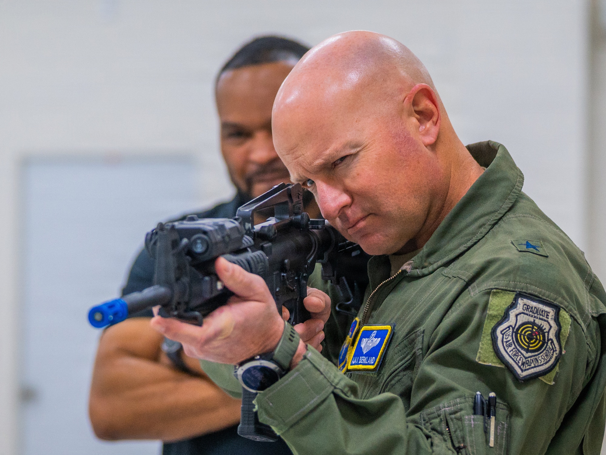 U.S. Air Force Brig. Gen. David Berkland, 56th Fighter Wing commander, utilizes a virtual range simulator during a demonstration, Dec. 15, 2025, at Luke Air Force Base, Arizona.