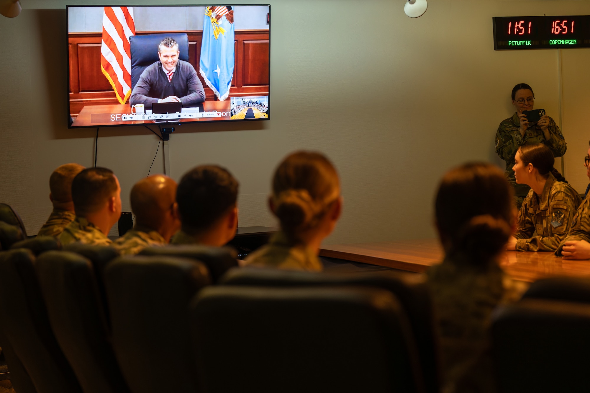 Secretary of War Pete Hegseth speaks via video call with Airmen and Guardians at Pituffik Space Force Base, Greenland, Dec. 19, 2025, delivering a holiday greeting and recognizing their service at the Department of War’s northernmost installation.