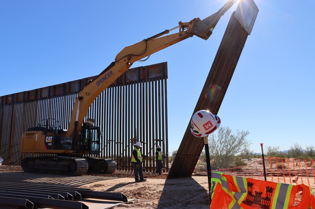 The U.S. Army Corps of Engineers contractors install border panels at the east end of the BMGR-1 project site near Yuma, Arizona, Dec. 16. USACE is replacing permanent border barriers along the southern border of the U.S. at the direction of the U.S. Army by the Secretary of War, in response to the presidential national emergency declaration dated Jan. 20, 2025, authorizing the use of Section 2803 of Title 10, U.S. Code. (no one in this image crossed the international border)