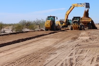 The U.S. Army Corps of Engineers contractors continue ground stabilization for the East end of the BMGR-1 project site near Yuma, Arizona, Dec. 3. USACE is replacing permanent border barriers along the southern border of the U.S. at the direction of the U.S. Army by the Secretary of War, in response to the presidential national emergency declaration dated Jan. 20, 2025, authorizing the use of Section 2803 of Title 10, U.S. Code.