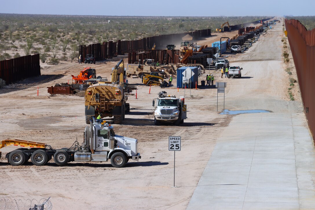 The U.S. Army Corps of Engineers contractors continue ground stabilization for the East end of the BMGR-1 project site near Yuma, Arizona, Dec. 3. USACE is replacing permanent border barriers along the southern border of the U.S. at the direction of the U.S. Army by the Secretary of War, in response to the presidential national emergency declaration dated Jan. 20, 2025, authorizing the use of Section 2803 of Title 10, U.S. Code.