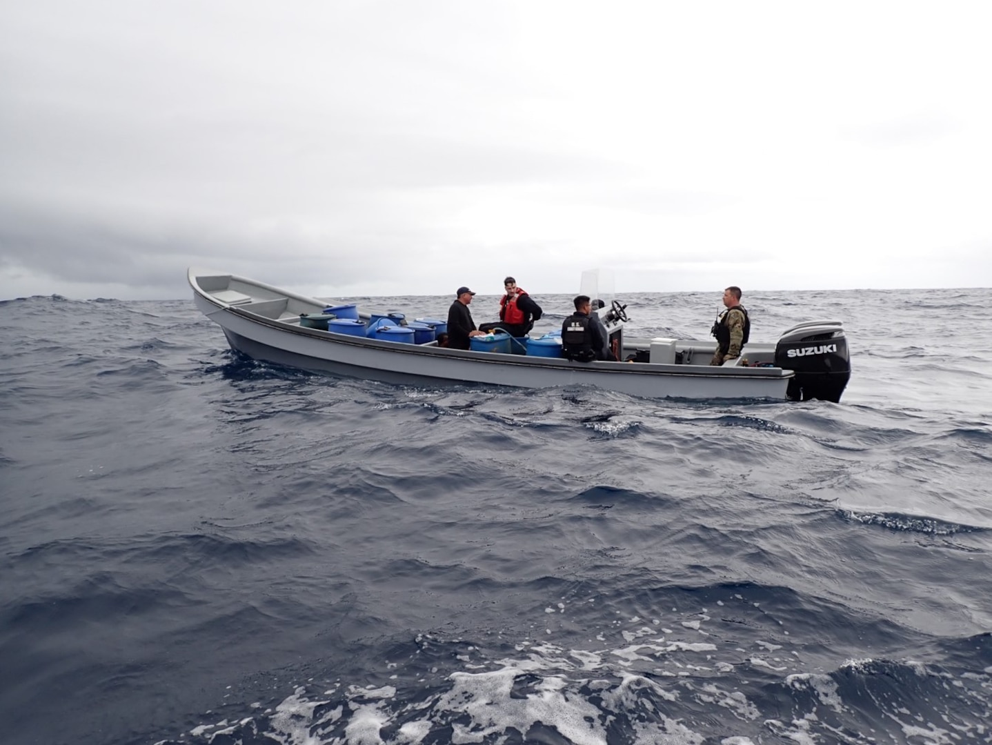 USCGC Active (WMEC 618) crew members conduct a boarding of a suspected drug smuggling vessel after an interdiction in the Eastern Pacific Ocean, Nov. 28, 2025. The U.S. Coast Guard narcotics interdiction efforts are aimed at thwarting transnational crime and helps keeps illegal activity far away from the United States coastlines.  (U.S. Coast Guard courtesy photo.)