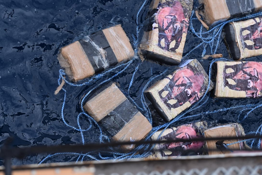 Thirty-three bales of contraband sit on the USCGC Active’s (WMEC 618) flight deck from an interdiction of a suspected drug smuggling vessel while patrolling the Eastern Pacific Ocean, Nov. 25, 2025. Active’s crew seized more than 3,300 pounds of cocaine and detained three suspected drug smugglers during the operation. (U.S. Coast Guard courtesy photo.)