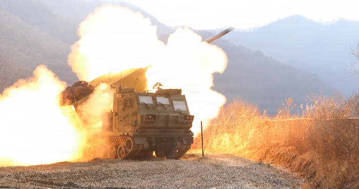Charlie Battery 1-38 Field Artillery Regiment fires the first rocket from the new M270A2 Multi Launch Rocket System, becoming the first unit to utilize the new equipment in a live fire setting on the Korean Peninsula at Rocket Valley, South Korea, Dec. 11, 2025.