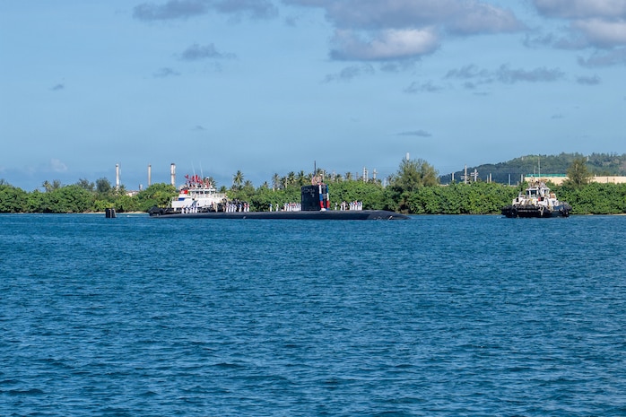 Los Angeles-class fast-attack submarine USS Annapolis (SSN 760) transits Apra Harbor, Naval Base Guam, returning to its homeport after completing a routine deployment in the Indo-Pacific, Dec. 19, 2025.
