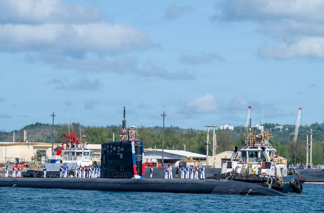 Los Angeles-class fast-attack submarine USS Annapolis (SSN 760) transits Apra Harbor, Naval Base Guam, returning to its homeport after completing a routine deployment in the Indo-Pacific, Dec. 19, 2025.
