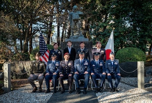 U.S. Service Members and Japan Ground Self-Defense Force members pose for a photo outside after a Japan Defense Cooperation Medal Ceremony
