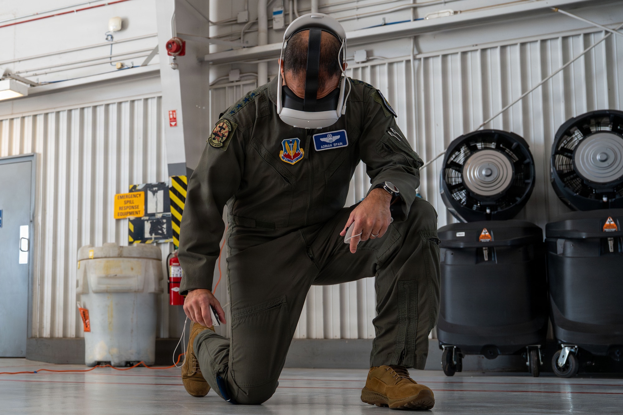 U.S. Air Force Gen. Adrian Spain, commander of Air Combat Command, uses a 355th Medical Group virtual reality training simulator at Davis-Monthan Air Force Base, Arizona, Dec. 16, 2025. The MDG showcased software that provides more comprehensive training for their Airmen, simulating realistic scenarios to enhance readiness. (U.S. Air Force photo by Senior Airman Jasmyne Bridgers-Matos)