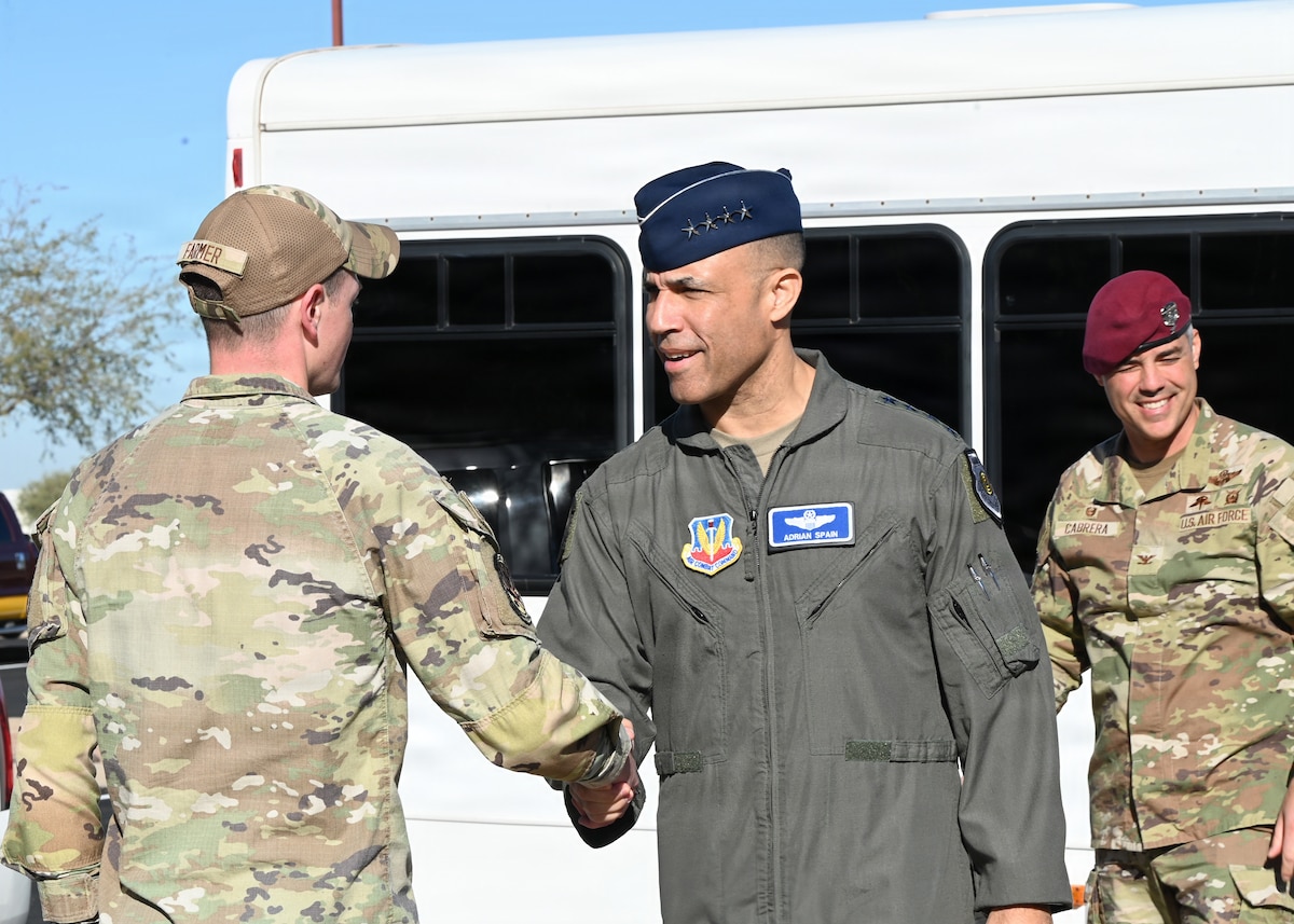 U.S. Air Force Gen. Adrian Spain, commander of Air Combat Command, arrives at the 355th Wing headquarters building at Davis-Monthan Air Force Base, Arizona, Dec. 16, 2025. Spain met with leaders across DM to discuss the installation’s mission and its role in supporting Air Combat Command and the Air Force. (U.S. Air Force photo by Senior Airman William Finn V)
