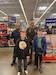Staff Sgt. Brain Swantek, Franklin Army Recruiting Station, poses during the Shop with a Hero event with the kids who chose their 