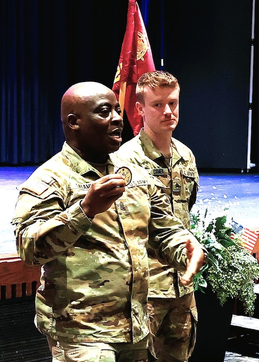 Command Sgt. Maj. Kehinde Salami, Senior Enlisted Leader of the Illinois National Guard, discusses the excellent performance of Illinois Army National Guard Staff Sgt. Bryce.