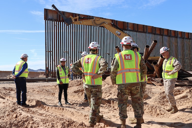 Senior Leaders from the U.S. Army Corps of Engineers monitor border barrier installation at the BMGR-1 project site Nov. 17 near Yuma, Arizona. USACE is replacing permanent border barriers along the southern border of the U.S. at the direction of the U.S. Army by the Secretary of War, in response to the presidential national emergency declaration dated Jan. 20, 2025, authorizing the use of Section 2803 of Title 10, U.S. Code