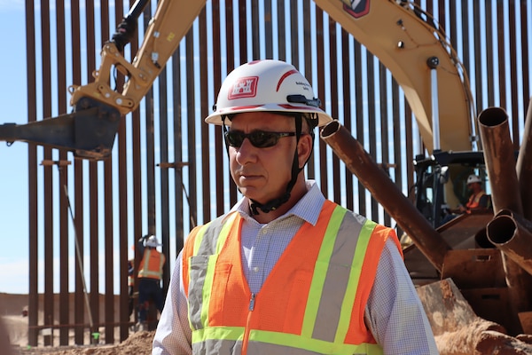Director of Programs and Deputy Engineer of the South Pacific Border Task Force Greg Hegge monitors border barrier installation progress at the BMGR-1 project site Nov. 17 near Yuma, Arizona. USACE is replacing permanent border barriers along the southern border of the U.S. at the direction of the U.S. Army by the Secretary of War, in response to the presidential national emergency declaration dated Jan. 20, 2025, authorizing the use of Section 2803 of Title 10, U.S. Code.