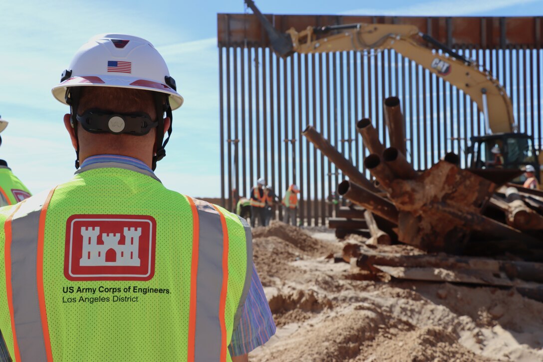 U.S. Army Corps of Engineers South Pacific Border Task Force install border barrier panels at the BMGR-1 project site near Yuma, Arizona, Nov. 17. USACE is replacing permanent border barriers along the southern border of the U.S. at the direction of the U.S. Army by the Secretary of War, in response to the presidential national emergency declaration dated Jan. 20, 2025, authorizing the use of Section 2803 of Title 10, U.S. Code.