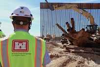 U.S. Army Corps of Engineers South Pacific Border Task Force install border barrier panels at the BMGR-1 project site near Yuma, Arizona, Nov. 17. USACE is replacing permanent border barriers along the southern border of the U.S. at the direction of the U.S. Army by the Secretary of War, in response to the presidential national emergency declaration dated Jan. 20, 2025, authorizing the use of Section 2803 of Title 10, U.S. Code.