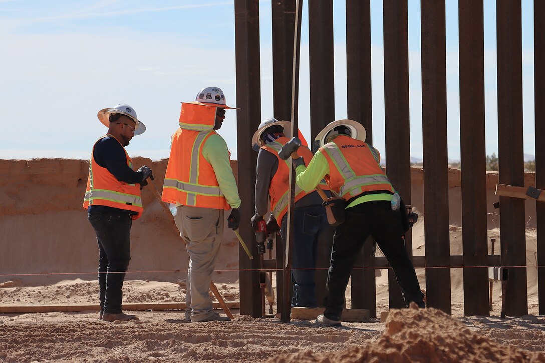 U.S. Army Corps of Engineers South Pacific Border Task Force install border barrier panels at the BMGR-1 project site near Yuma, Arizona, Nov. 17. USACE is replacing permanent border barriers along the southern border of the U.S. at the direction of the U.S. Army by the Secretary of War, in response to the presidential national emergency declaration dated Jan. 20, 2025, authorizing the use of Section 2803 of Title 10, U.S. Code.