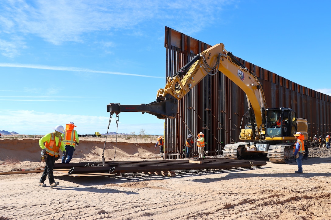 U.S. Army Corps of Engineers South Pacific Border Task Force install border barrier panels at the BMGR-1 project site near Yuma, Arizona, Nov. 17. USACE is replacing permanent border barriers along the southern border of the U.S. at the direction of the U.S. Army by the Secretary of War, in response to the presidential national emergency declaration dated Jan. 20, 2025, authorizing the use of Section 2803 of Title 10, U.S. Code.