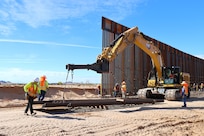 U.S. Army Corps of Engineers South Pacific Border Task Force install border barrier panels at the BMGR-1 project site near Yuma, Arizona, Nov. 17. USACE is replacing permanent border barriers along the southern border of the U.S. at the direction of the U.S. Army by the Secretary of War, in response to the presidential national emergency declaration dated Jan. 20, 2025, authorizing the use of Section 2803 of Title 10, U.S. Code.