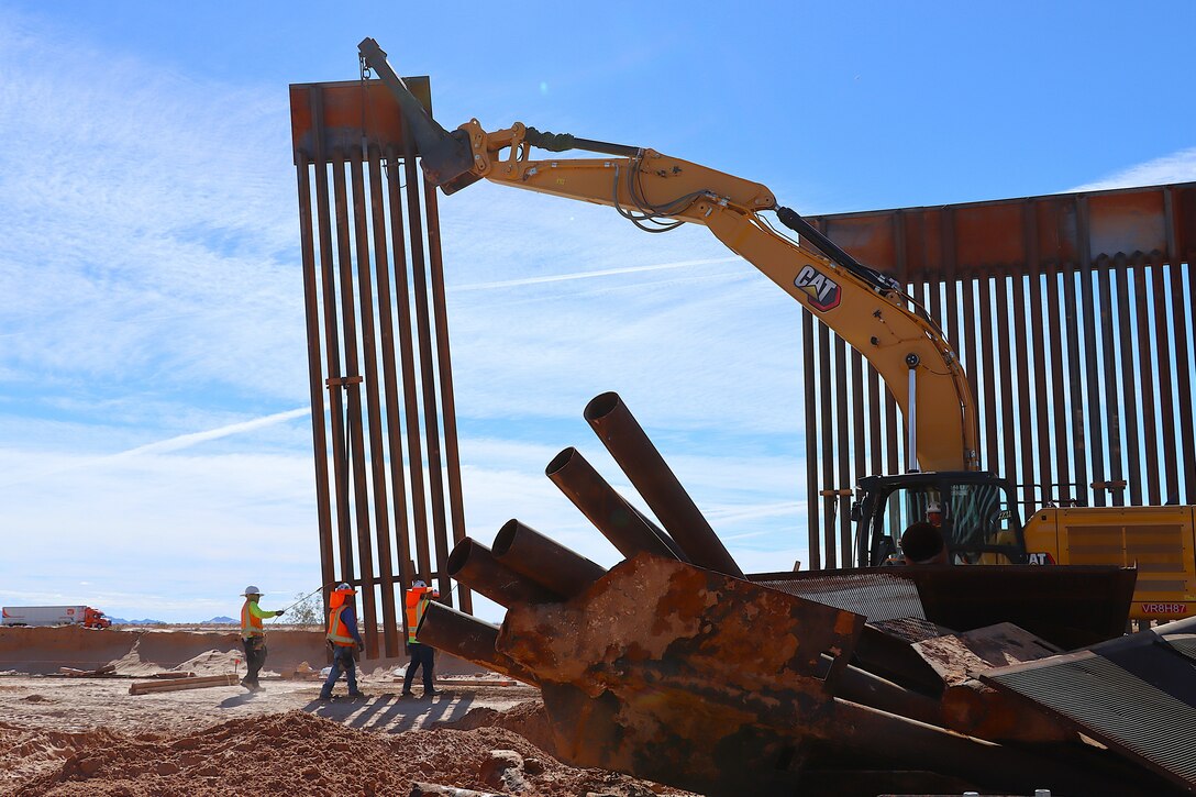U.S. Army Corps of Engineers South Pacific Border Task Force install border barrier panels at the BMGR-1 project site near Yuma, Arizona, Nov. 17. USACE is replacing permanent border barriers along the southern border of the U.S. at the direction of the U.S. Army by the Secretary of War, in response to the presidential national emergency declaration dated Jan. 20, 2025, authorizing the use of Section 2803 of Title 10, U.S. Code.