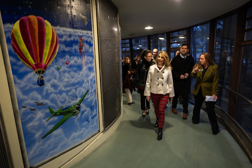 Mrs. Cindy Wilsbach, wife of Air Force Chief of Staff Gen. Ken Wilsbach, middle, receives a tour of the School Age Center at Ramstein Air Base, Germany, Dec. 23, 2025. The engagement illustrates how relationships built through communication and care for families enhances Airmen readiness, the wing’s resilience and overall mission effectiveness. (U.S. Air Force photo by Senior Airman Edgar Grimaldo)