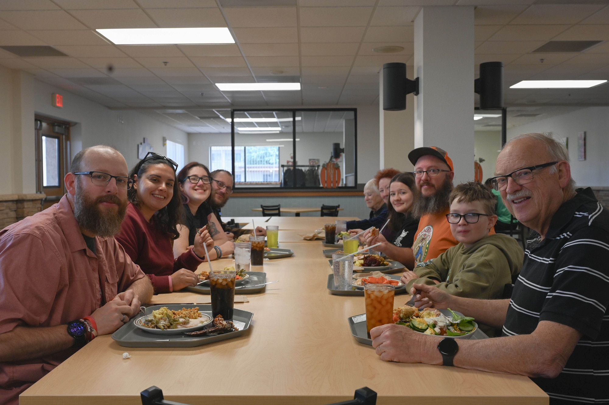 U.S. Army and U.S. Marine Corps veterans and their families gather for a Thanksgiving day meal in the Desert Inn Dining Facility at Davis-Monthan Air Force Base, Arizona, Nov. 27, 2025. These families have dined at the DFAC on Thanksgiving Day for the last 15 years – establishing a military family tradition at Davis-Monthan AFB. (U.S. Air Force photo by Staff Sgt. Kahdija Slaughter)