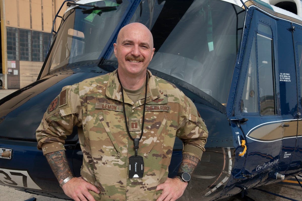 U.S. Air Force Capt. Joshua A. Lemon, 316th Operations Group executive officer, stands in front of a UH-1N Huey helicopter at Joint Base Andrews, Maryland, Sept. 23, 2025. Lemon enlisted in 2003 and reached the rank of senior master sergeant before deciding to continue his career as an officer in 2019.