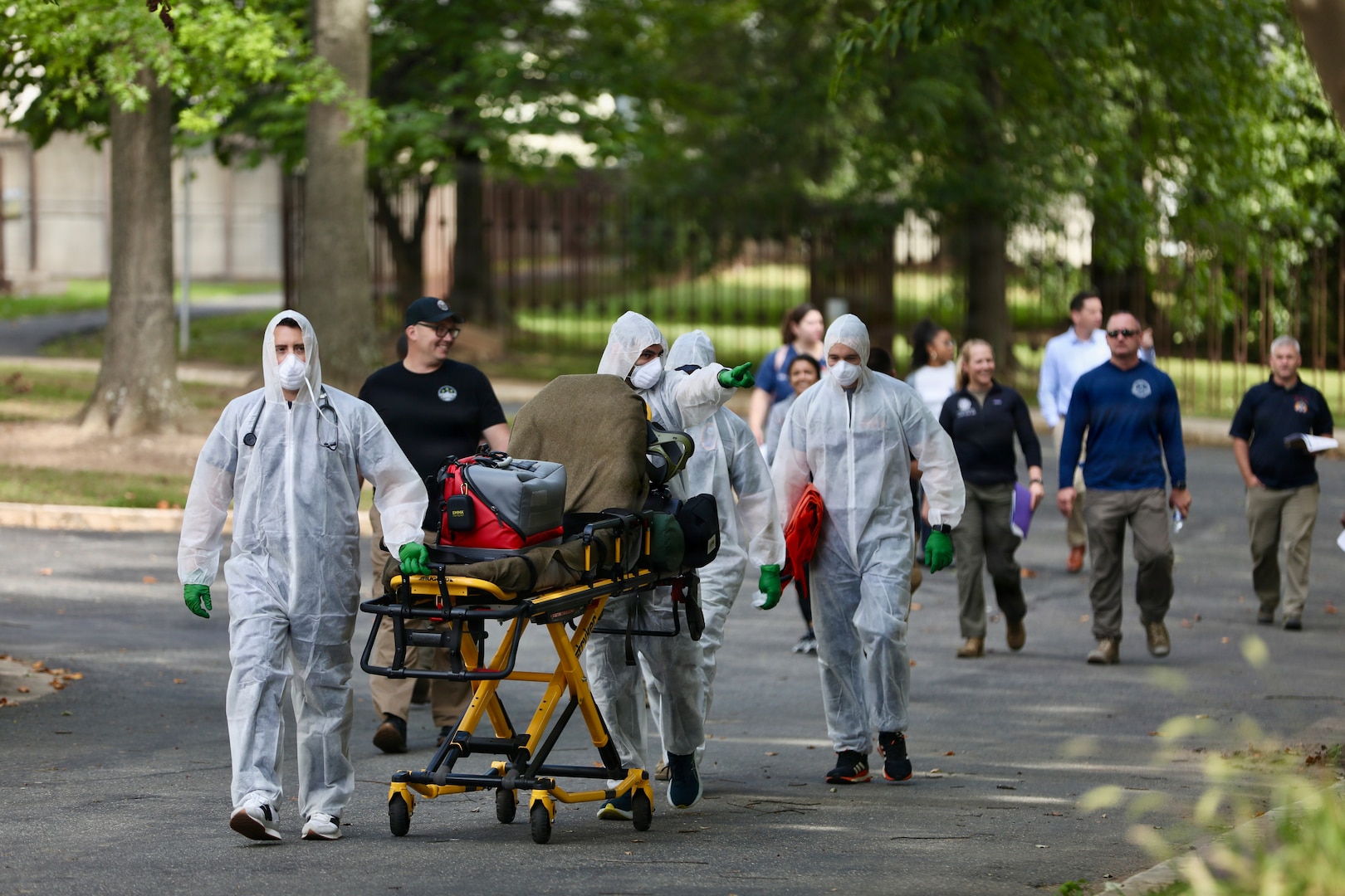 Members of the D.C. National Guard's 33rd Weapons of Mass Destruction Civil Support Team (WMD-CST) join MedStar Health SiTEL clinicians, physicians, and medical students for an advanced emergency simulation in Northwest Washington, D.C., Aug. 28, 2025. The joint exercise tested rapid medical response in contaminated and high-risk environments, strengthening interagency readiness and ensuring both partners are better prepared to protect the community.