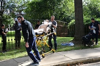 Members of the D.C. National Guard's 33rd Weapons of Mass Destruction Civil Support Team (WMD-CST) join MedStar Health SiTEL clinicians, physicians, and medical students for an advanced emergency simulation in Northwest Washington, D.C., Aug. 28, 2025. The joint exercise tested rapid medical response in contaminated and high-risk environments, strengthening interagency readiness and ensuring both partners are better prepared to protect the community.