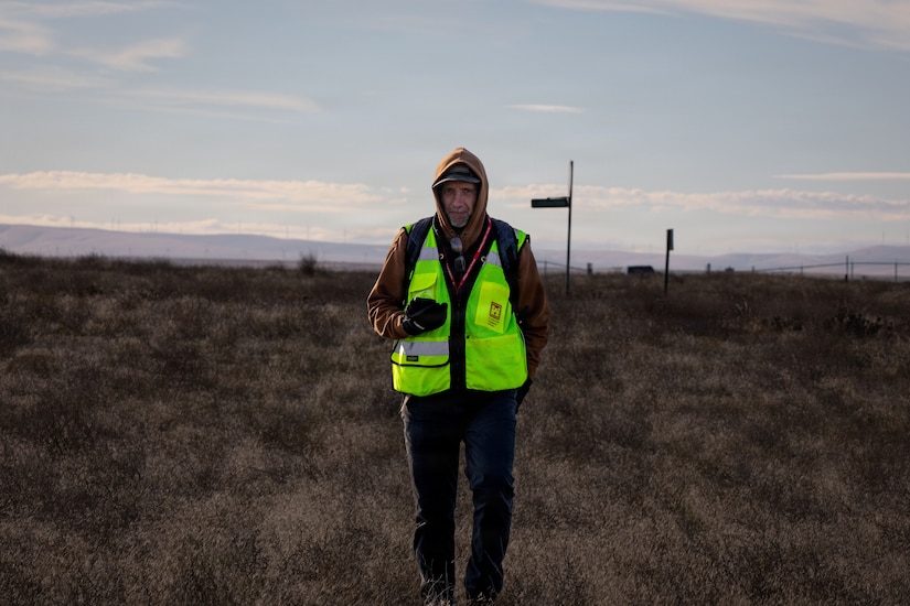 Military Munitions Response Program Manager Jason Blair conducts fieldwork at the former Umatilla Chemical Depot in Hermiston, Oregon, Nov. 18, 2025. The team conducted visual inspections of the buffer area, looking for signs of munitions. The area must pass inspection and be declared safe before it can be handed over to the Oregon National Guard’s Rees Training Center for use as training grounds. (U.S. Army photo by Makenzie Leonard)