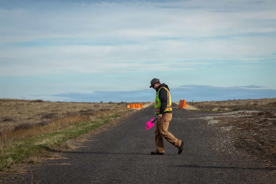 (left to right) Mitchel Bieber, Rogan Maxwell & Evan Parsons, Military Munitions Response Program staff, conduct fieldwork at the former Umatilla Chemical Depot in Hermiston, Oregon, Nov. 18, 2025. The team conducted visual inspections of the buffer area while looking for signs of munitions. The area must pass inspection and be declared safe before it can be handed over to the Oregon National Guard’s Rees Training Center for use as training grounds. (U.S. Army photo by Makenzie Leonard)