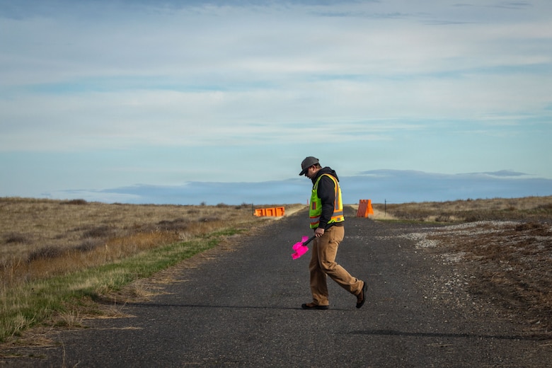 (left to right) Mitchel Bieber, Rogan Maxwell & Evan Parsons, Military Munitions Response Program staff, conduct fieldwork at the former Umatilla Chemical Depot in Hermiston, Oregon, Nov. 18, 2025. The team conducted visual inspections of the buffer area while looking for signs of munitions. The area must pass inspection and be declared safe before it can be handed over to the Oregon National Guard’s Rees Training Center for use as training grounds. (U.S. Army photo by Makenzie Leonard)