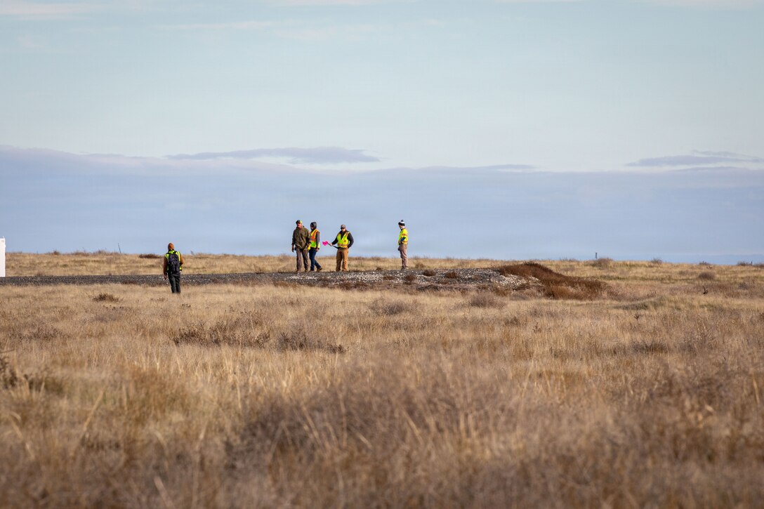 Military Munitions Response Program staff, led by program manager Jason Blair, conduct fieldwork at the former Umatilla Chemical Depot in Hermiston, Oregon, Nov. 18, 2025. The team conducted visual inspections of the buffer area while looking for signs of munitions. The area must pass inspection and be declared safe before it can be handed over to the Oregon National Guard’s Rees Training Center for use as training grounds. (U.S. Army photo by Makenzie Leonard)