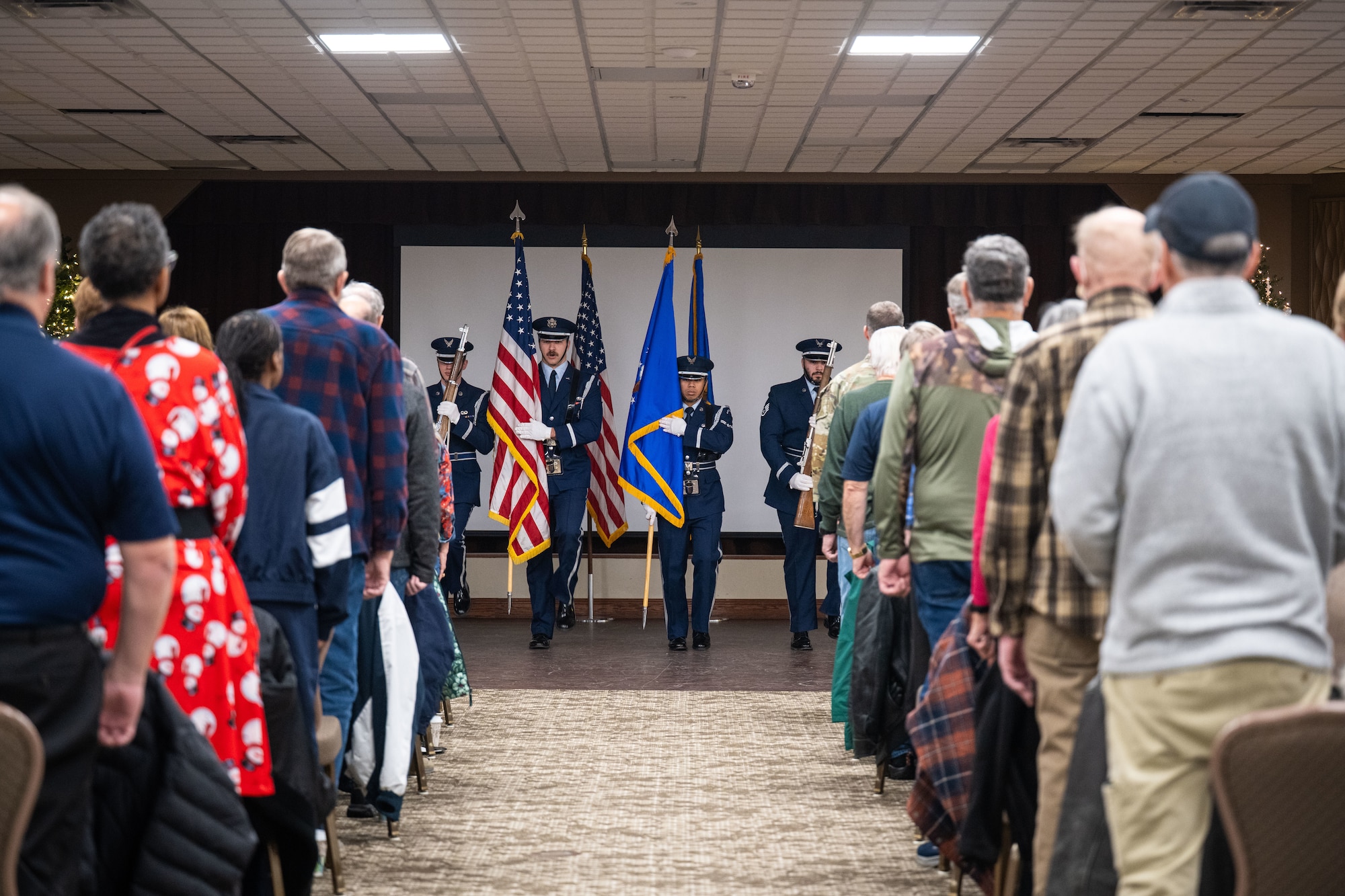 Wright-Patterson Air Force Base Honor Guard performs the colors at the Retiree Appreciation Day Dec 19, 2025, at Wright-Patterson Air Force Base. The event provides networking opportunities to link military retirees to various veteran resources. (U.S. Air Force photo by Jack Gardner)