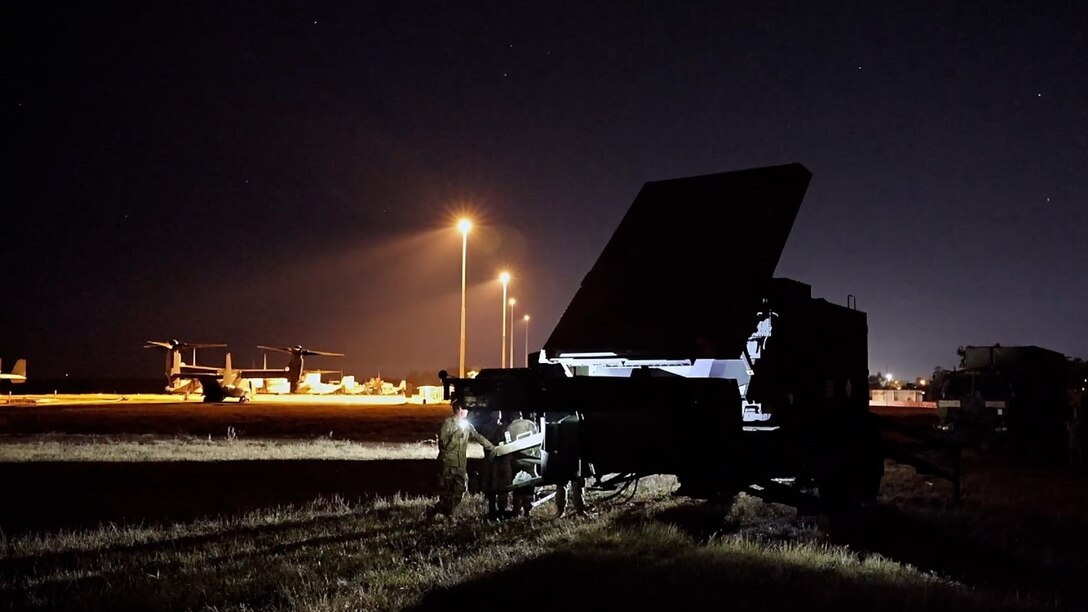 U.S. Army Soldiers from 1st Battalion, 1st Air Defense Artillery Regiment, 38th Air Defense Artillery Brigade emplace a Patriot radar system under night conditions, July 19, 2025. The Janus Program, the Army’s next-generation nuclear power program, aims to deliver secure, resilient, and reliable energy to support national defense installations and critical missions.