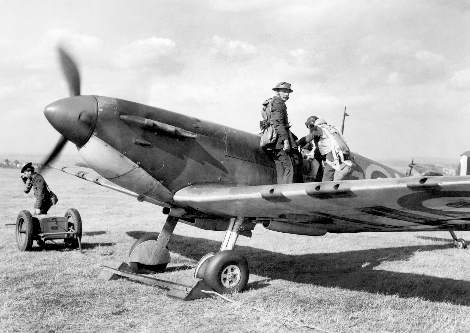 The Supermarine Spitfire was another legendary fighter of the Battle of Britain. Here, a No. 66 Squadron pilot climbs into a Spitfire Mk I at Gravesend, near London, September 1940.