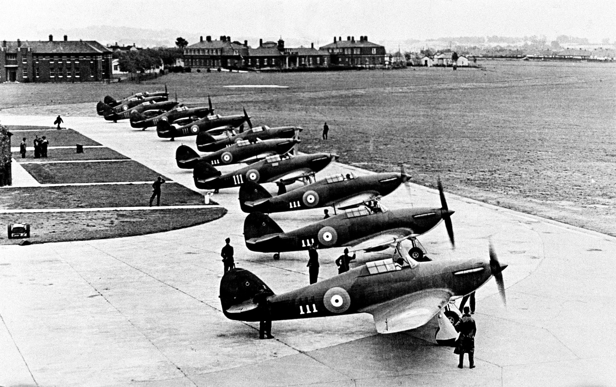 The RAF’s first Hurricanes at RAF Northolt, near London, in 1938. The Hurricane was the first British production fighter to exceed 300 mph in level flight, carry eight guns, and have a retractable undercarriage. More than 14,500 Hurricanes were built.