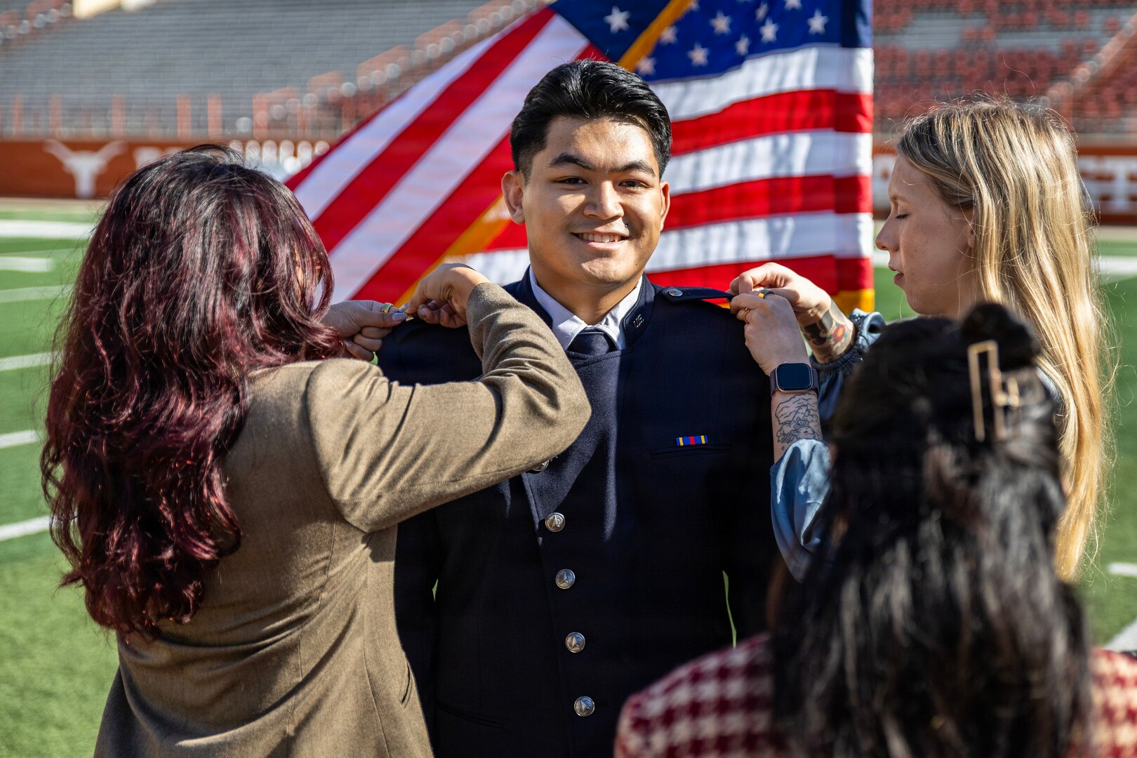 Cadet Kimo Martinez is pinned as a second lieutenant in the U.S. Space Force during Air Force ROTC Detachment 825’s winter 2025 commissioning ceremony at Darrell K Royal–Texas Memorial Stadium in Austin, Texas, on Dec. 21, 2025.