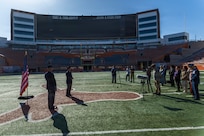 Second from left, U.S. Space Force 2nd Lt. Kimo Martinez, Air Force ROTC Detachment 825, addresses his guests during his winter commissioning ceremony at Darrell K Royal–Texas Memorial Stadium in Austin, Texas, Dec. 21, 2025.