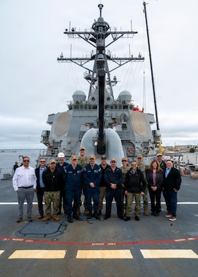 251208-N-IX644-1001 (Dec. 8, 2025) MAYPORT, Fla. U.S. Navy Sailors assigned to the USS Carney (DDG 64) and various Navy Medicine commands, alongside civilian and contractor partners, pose for a photo on the ship's flight deck during the pilot of the Joint Operational Medicine Information System (JOMIS) Operational Medicine Care Delivery Platform (OpMed CDP), a new modernized digital health record system, in Mayport, Fla., Dec. 8, 2025. For 250 years, Navy Medicine has delivered quality healthcare and enduring expeditionary medical support to the warfighter on, below, and above the sea, and ashore.  (U.S. Navy photo by Mass Communication Specialist 2nd Class Sasha Ambrose)