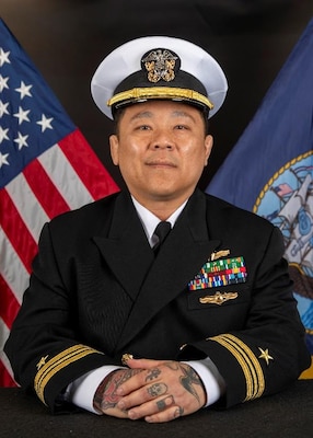 240407-N-N0443-3009 YOKOSUKA, Japan (April 7, 2024) Official portrait of Lt. Cmdr. Hungchi Lee.  (U.S. Navy photo)
