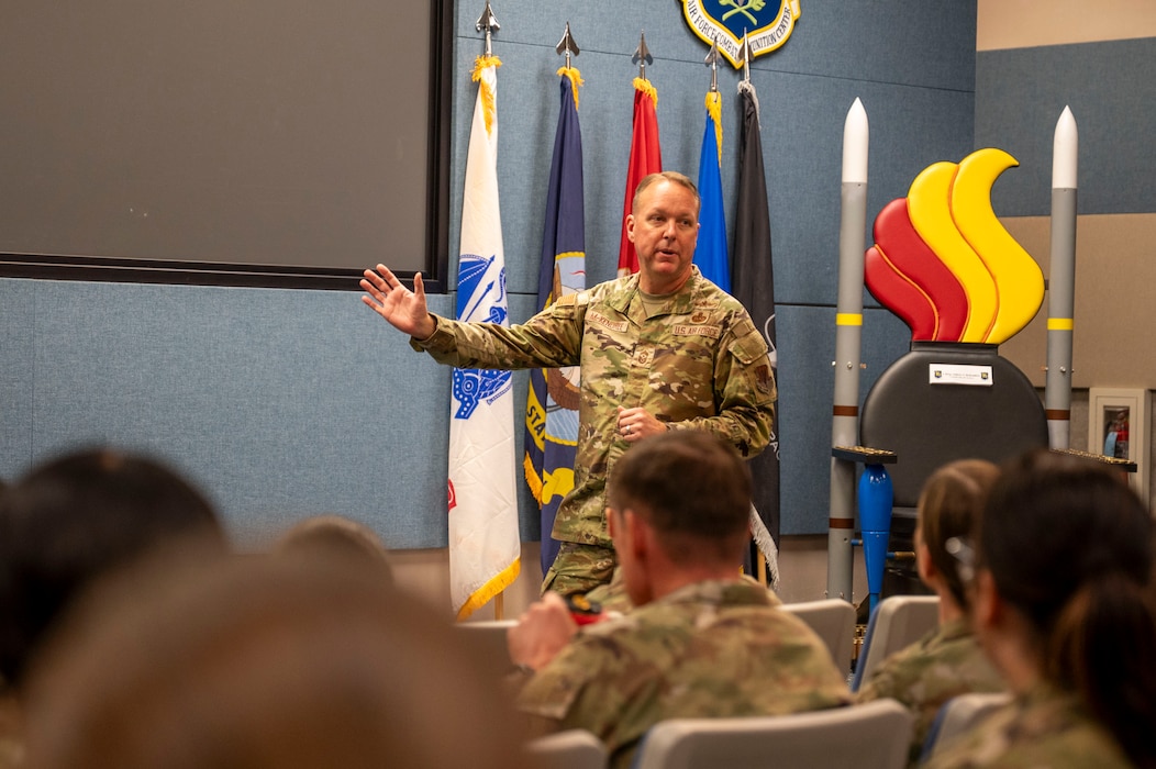 U.S. Air Force Chief Master Sgt. Andrew McKendree, Command Chief Master Sgt. of the 16th Air Force, addresses senior noncommissioned officers during an all call on Beale Air Force Base, California, Dec. 17, 2025.