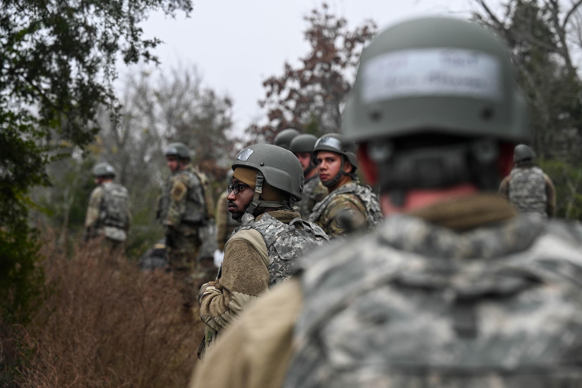 Airmen conduct a patrol during a training exercise.