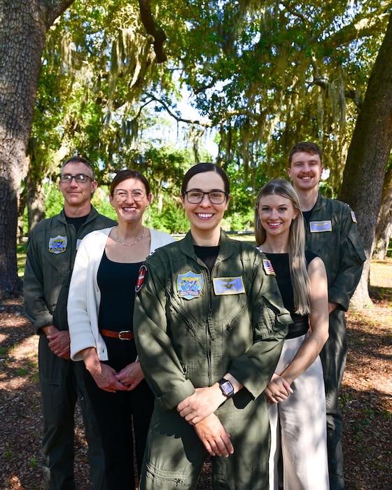 The Operational Psychology Department of the Naval Aerospace Medical Institute (NAMI) poses for a photo, Aug. 16. (From left to right) Lt. Cmdr. Michael Kukenberger, Kaylin Strong, Lt. Rebecca NeSmith Allison Bayro, Lt. Quin Kidder. Comprised of both military and civilian partners and staff, the operational psychology departments ongoing mission is to support the needs of the fleet, reduce attrition and study the human component of the aviation weapon system. With five detachments, 12 training centers, and facilities in over 60 locations across the United States, NMOTC provides high impact individual medical training for the Navy, other U.S. armed forces, and allied nations around the globe. (U.S. Navy photo by Mass Communication Specialist 1st Class Russell Lindsey SW/AW)