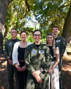 The Operational Psychology Department of the Naval Aerospace Medical Institute (NAMI) poses for a photo, Aug. 16. (From left to right) Lt. Cmdr. Michael Kukenberger, Kaylin Strong, Lt. Rebecca NeSmith Allison Bayro, Lt. Quin Kidder. Comprised of both military and civilian partners and staff, the operational psychology departments ongoing mission is to support the needs of the fleet, reduce attrition and study the human component of the aviation weapon system. With five detachments, 12 training centers, and facilities in over 60 locations across the United States, NMOTC provides high impact individual medical training for the Navy, other U.S. armed forces, and allied nations around the globe. (U.S. Navy photo by Mass Communication Specialist 1st Class Russell Lindsey SW/AW)