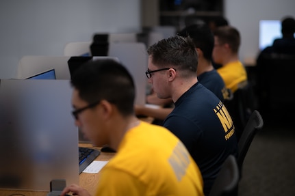 Naval aviation candidates take the Aviation Standardized Test Battery (ASTB) in the Naval Aerospace Medical Institute's (NAMI) behavioral research lab, Aug. 4. The ASTB is used to determine a person's viability as an aviation officer candidate. With five detachments, 12 training centers, and facilities in over 60 locations across the United States, NMOTC provides high impact individual medical training for the Navy, other U.S. armed forces, and allied nations around the globe. (U.S. Navy photo by Mass Communication Specialist 1st Class Russell Lindsey SW/AW)