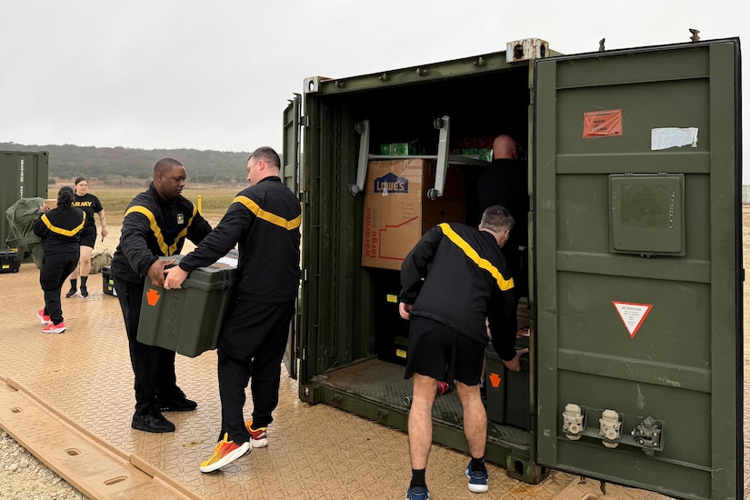 U.S. Soldiers with the 109th Mobile Public Affairs Detachment pack a shipping container with unit equipment at their mobilization station at Fort Hood, Texas, Dec. 17, 2025. The unit is preparing to deploy to Europe in support of U.S. Special Operations Command Europe. (U.S. Army National Guard photo by Maj. Travis Mueller)