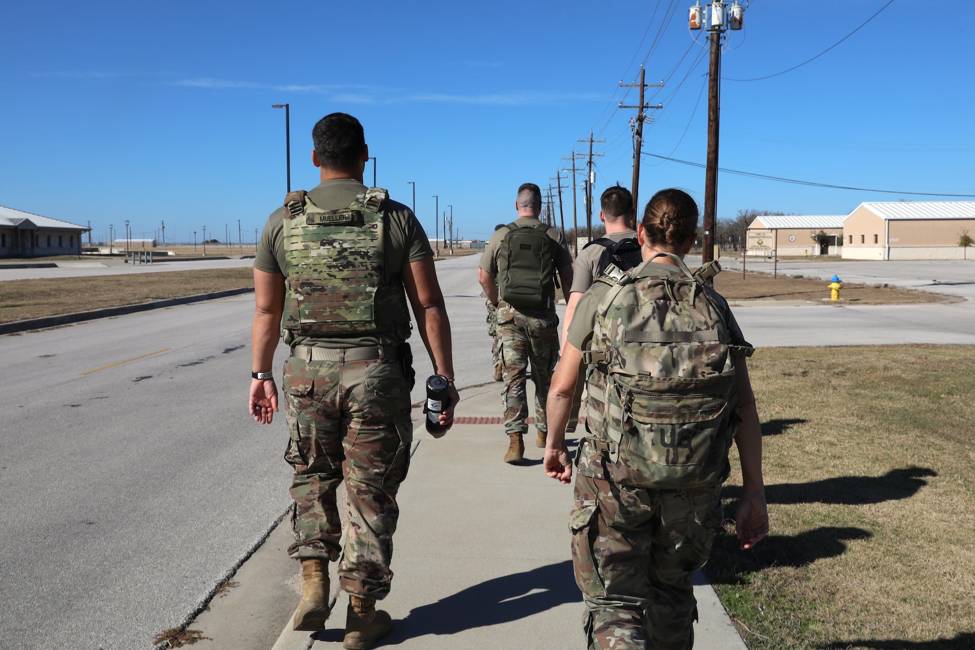 U.S. Soldiers with the 109th Mobile Public Affairs Detachment, 213th Regional Support Group, march around Fort Hood, Texas, Dec. 20, 2025. The march supported ongoing training efforts to enhance fitness and unit readiness. (U.S. Army National Guard photo by Staff Sgt. Melyssa Vazquez)
