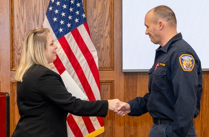 Fort Indiantown Gap firefighters: Assistant Chief Travis Duncan, Firefighter/EMT Jesse Berdanier, Firefighter/EMT Benjamin Condran; and Pennsylvania State Police Trooper Brody Myers receive the Clinical Save Award during a ceremony in the Hartranft Conference Room on Fort Indiantown Gap. The ceremony honors their life-saving efforts to resuscitate an individual involved in a vehicle accident on Interstate 81, near the installation, Dec. 5. (Pennsylvania National Guard photo by Wayne V. Hall)